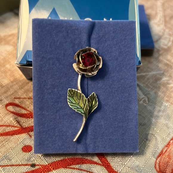 Avon Jewelry - Avon 2004 birthstone rose pin July/ruby new in box